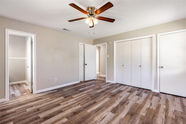 2820 Bois D Arc St, Commerce, TX 75428 - unfurnished bedroom featuring wood finished floors and baseboards