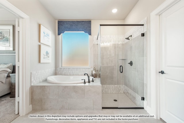 ensuite bathroom with tile patterned floors, a shower stall, a garden tub, and connected bathroom