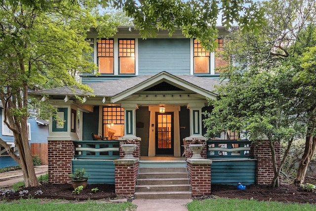 123 S Rosemont Ave, Dallas, TX 75208 - american foursquare style home with a porch and roof with shingles