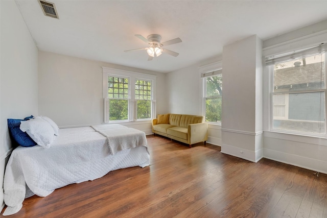 123 S Rosemont Ave, Dallas, TX 75208 - bedroom featuring wood finished floors, baseboards, and a ceiling fan