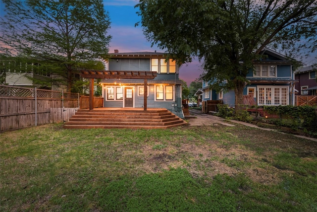 123 S Rosemont Ave, Dallas, TX 75208 - back of house at dusk featuring a pergola and a wooden deck