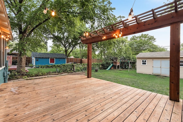 123 S Rosemont Ave, Dallas, TX 75208 - wooden terrace featuring an outdoor structure, a playground, a pergola, and a shed
