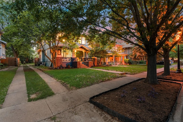 123 S Rosemont Ave, Dallas, TX 75208 - obstructed view of property with covered porch and brick siding