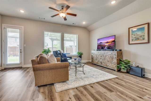living area with recessed lighting, a ceiling fan, visible vents, baseboards, and wood finished floors