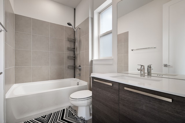 full bath featuring vanity, toilet, and tub / shower combination