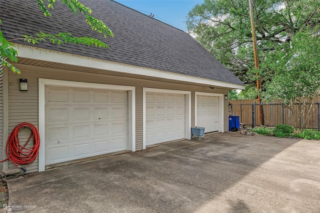garage with fence