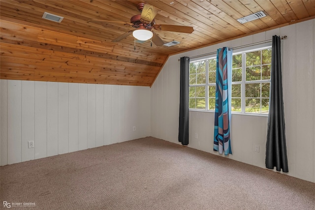 bonus room with carpet floors, visible vents, wood ceiling, and vaulted ceiling