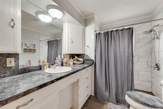 bathroom featuring a shower with curtain, tasteful backsplash, wood finished floors, vanity, and toilet
