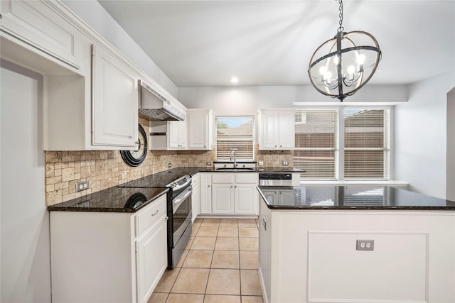 kitchen featuring a sink, ventilation hood, a chandelier, tasteful backsplash, and stainless steel electric stove