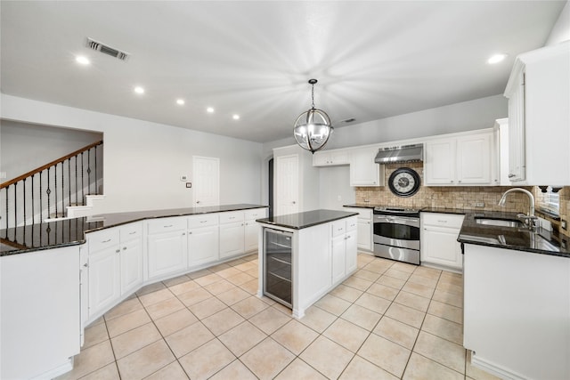 kitchen with stainless steel electric range, a sink, beverage cooler, light tile patterned floors, and under cabinet range hood