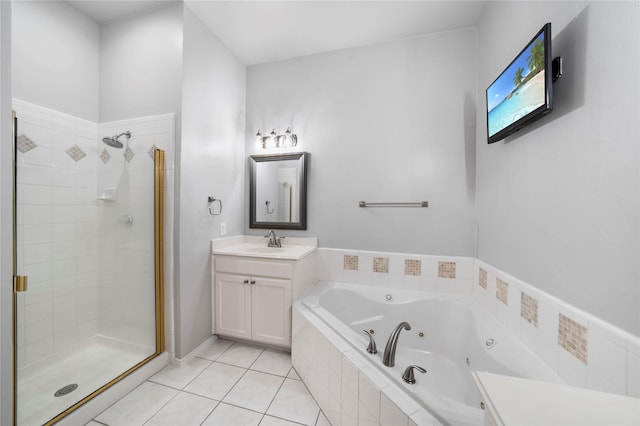 bathroom with vanity, a jetted tub, tile patterned flooring, and a stall shower