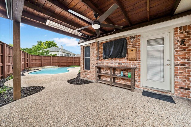 10715 Wild Oak Dr, Frisco, TX 75035 - view of patio / terrace with a fenced backyard, ceiling fan, and a hot tub