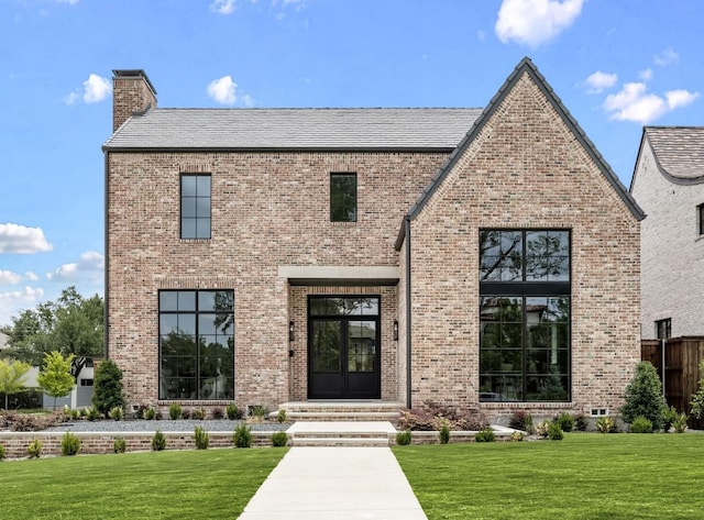 3201 Beverly, Highland Park, TX 75205 - view of front facade with a chimney, a front lawn, and brick siding