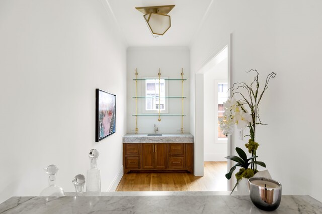 3201 Beverly, Highland Park, TX 75205 - kitchen with double oven range, a sink, healthy amount of natural light, tasteful backsplash, and ornamental molding