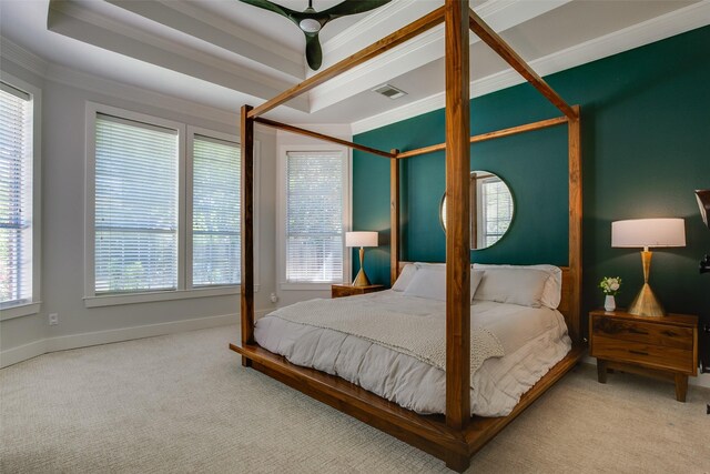 bedroom featuring crown molding, baseboards, carpet floors, and visible vents