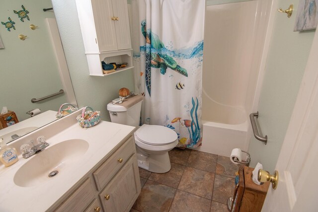 full bath with stone finish flooring, shower / tub combo, toilet, and vanity