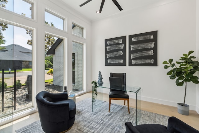 5702 Glen Heather Dr, Dallas, TX 75252 - living area featuring ceiling fan, wood finished floors, and baseboards