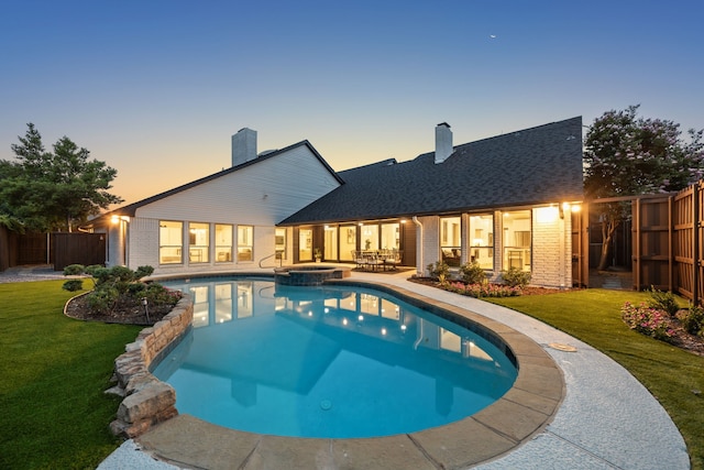 5702 Glen Heather Dr, Dallas, TX 75252 - view of swimming pool featuring a patio area and a pool with connected hot tub