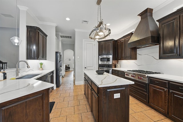 5314 Meritage Ln, Grapevine, TX 76051 - kitchen with a sink, stainless steel appliances, custom exhaust hood, arched walkways, and dark brown cabinets