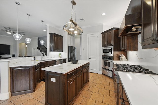 5314 Meritage Ln, Grapevine, TX 76051 - kitchen featuring appliances with stainless steel finishes, a sink, ornamental molding, a warming drawer, and ventilation hood