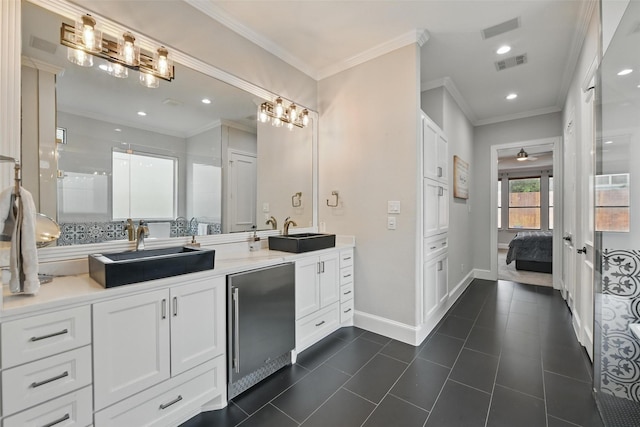 5314 Meritage Ln, Grapevine, TX 76051 - ensuite bathroom featuring double vanity, baseboards, a shower with shower door, tile patterned floors, and crown molding