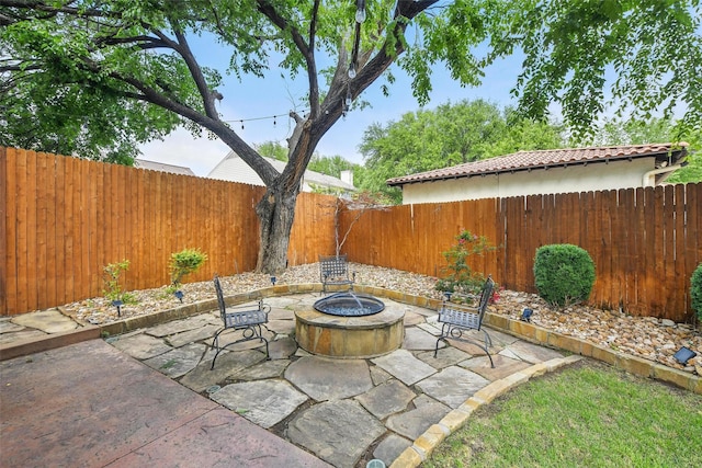 5314 Meritage Ln, Grapevine, TX 76051 - view of patio / terrace with an outdoor fire pit and a fenced backyard