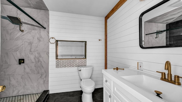 760 College Farm, Stephenville, TX 76401 - full bathroom with wood walls, a tile shower, and vanity