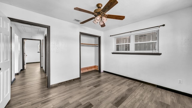 760 College Farm, Stephenville, TX 76401 - unfurnished bedroom with attic access, a closet, visible vents, baseboards, and wood finished floors
