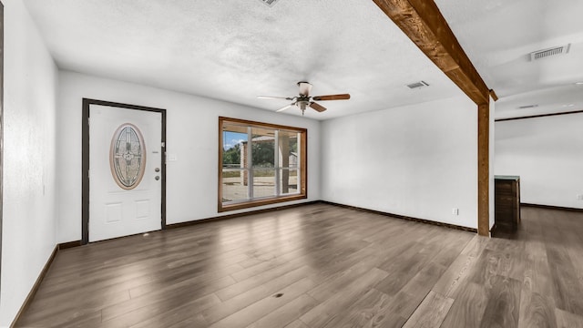 760 College Farm, Stephenville, TX 76401 - interior space featuring wood finished floors, ceiling fan, and visible vents