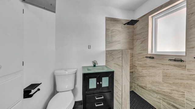 760 College Farm, Stephenville, TX 76401 - full bath with toilet, a sink, and tiled shower