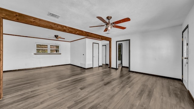 760 College Farm, Stephenville, TX 76401 - spare room with wood finished floors, visible vents, a ceiling fan, and baseboards