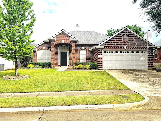 ranch-style house featuring a chimney, concrete driveway, an attached garage, and brick siding