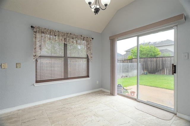 unfurnished room featuring baseboards, an inviting chandelier, and vaulted ceiling