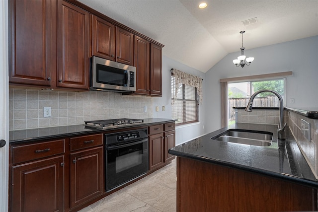 kitchen with a sink, stainless steel appliances, tasteful backsplash, pendant lighting, and lofted ceiling