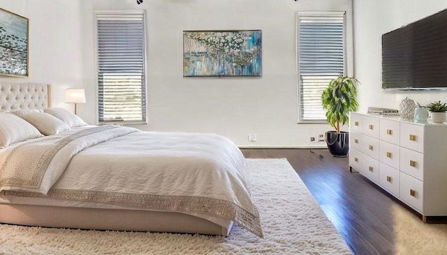 682 Crockett Dr, Lavon, TX 75166 - bedroom featuring wood finished floors and baseboards
