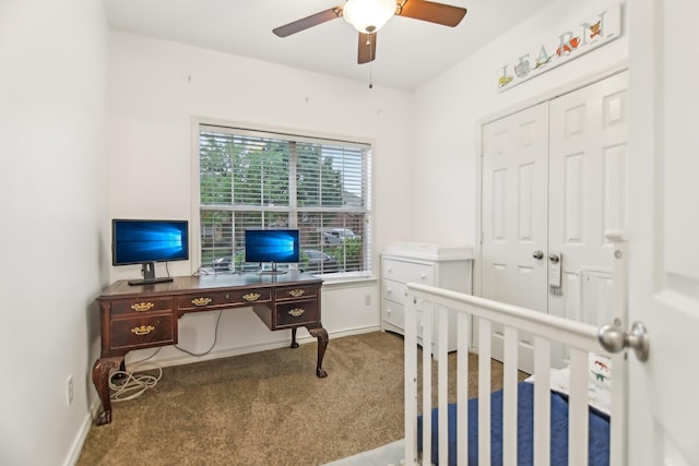 carpeted bedroom featuring baseboards, a ceiling fan, and a closet