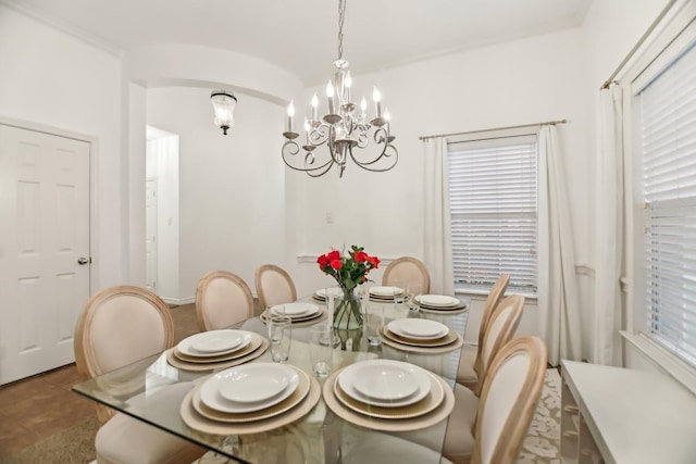 dining area with a notable chandelier