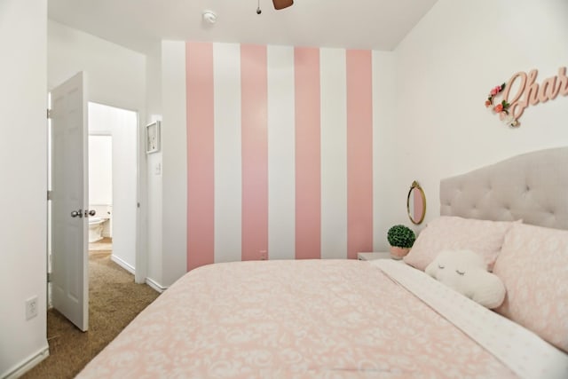 carpeted bedroom with baseboards and a ceiling fan