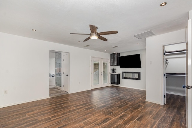 1520 Belgrade Dr, Plano, TX 75023 - unfurnished living room featuring dark wood-style floors, a ceiling fan, recessed lighting, and a glass covered fireplace