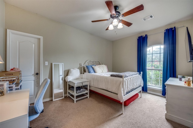 bedroom featuring carpet, visible vents, ceiling fan, and baseboards