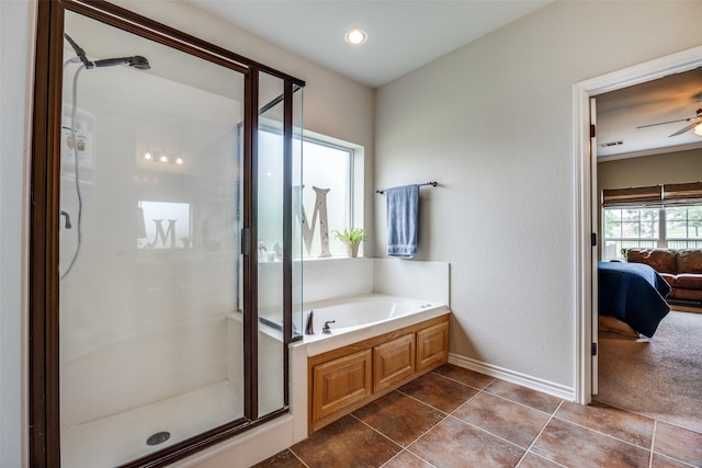 ensuite bathroom featuring a garden tub, tile patterned flooring, a shower stall, and ensuite bathroom