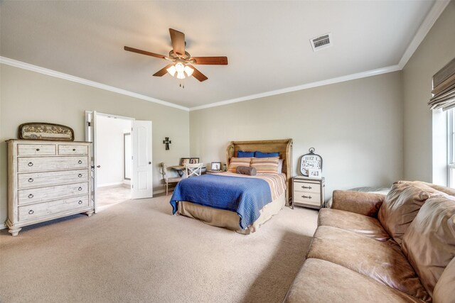 bedroom featuring ceiling fan, crown molding, visible vents, carpet, and baseboards