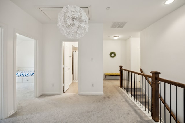 2321 Molly Ln, Plano, TX 75074 - hall with carpet floors, attic access, an upstairs landing, baseboards, and visible vents