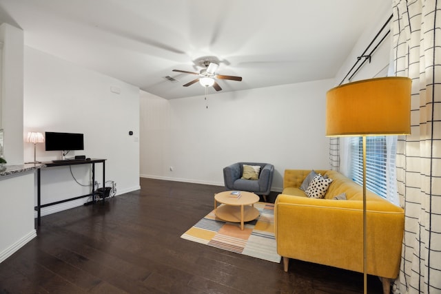 2321 Molly Ln, Plano, TX 75074 - living area featuring wood finished floors, a ceiling fan, visible vents, and baseboards
