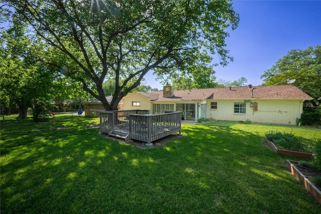 6413 Wrigley Way, Fort Worth, TX 76133 - view of yard with a deck, a vegetable garden, and a fenced backyard
