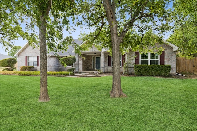 117 Carrington Dr, Fate, TX 75032 - single story home featuring brick siding, fence, and a front yard