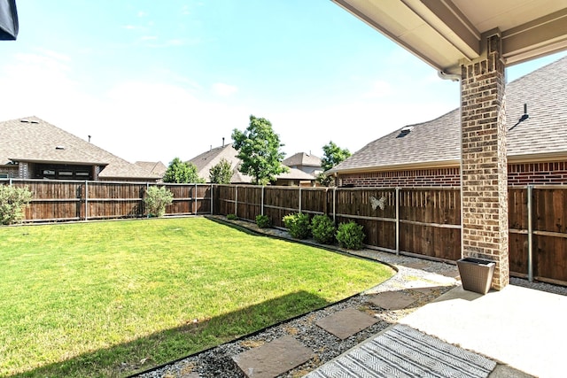 view of yard featuring a fenced backyard