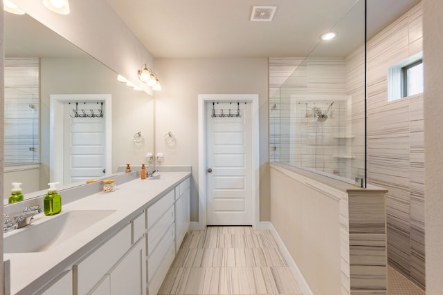 4114 Anglers Way, Royse City, TX 75189 - full bath featuring visible vents, walk in shower, double vanity, and a sink