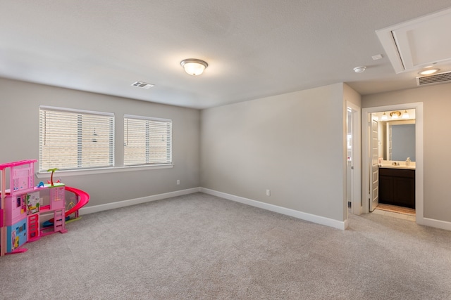 4114 Anglers Way, Royse City, TX 75189 - game room with attic access, visible vents, carpet flooring, and baseboards