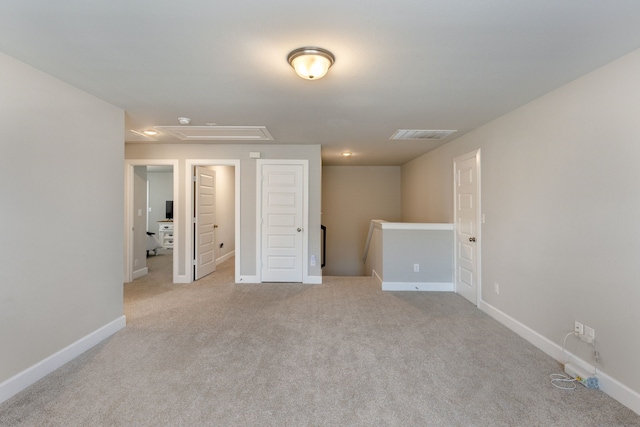 4114 Anglers Way, Royse City, TX 75189 - empty room with attic access, visible vents, light carpet, and baseboards